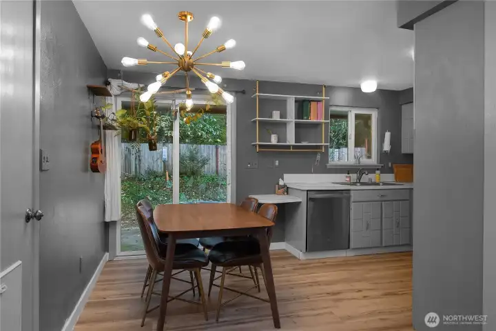 New lighting fixture in the Dining area, slider to the back patio.