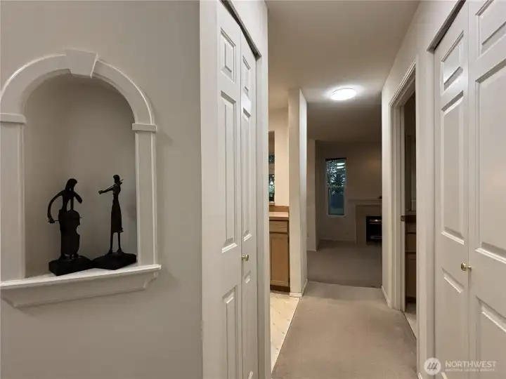 Hallway and closets on both sides