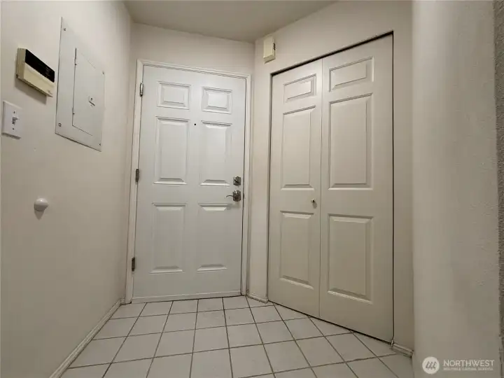 Entrance; Laundry closet on the right