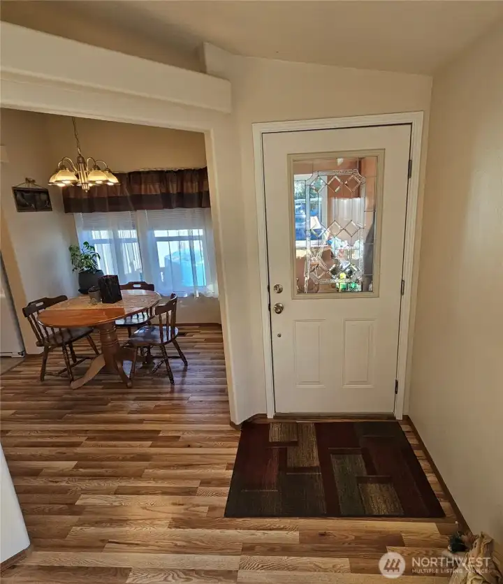 Enter into the home and enjoy the beautiful hardwood flooring throughout the home.
