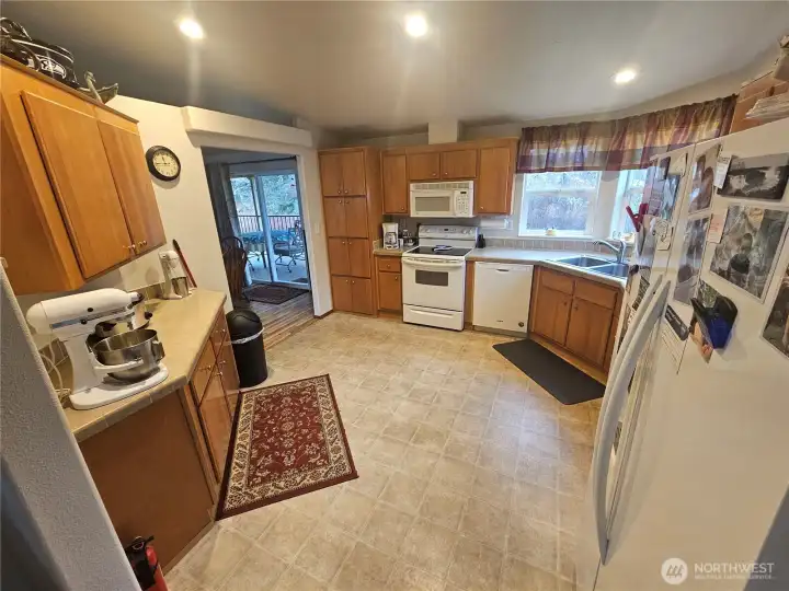Lots of space in the cabinets and plenty of counter space make this kitchen very workable.