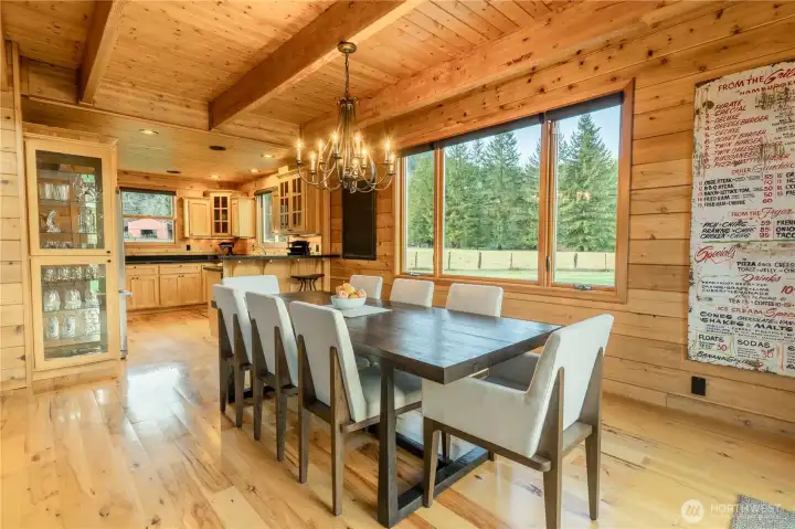 Great room concept design with raised eat-in bar off kitchen.