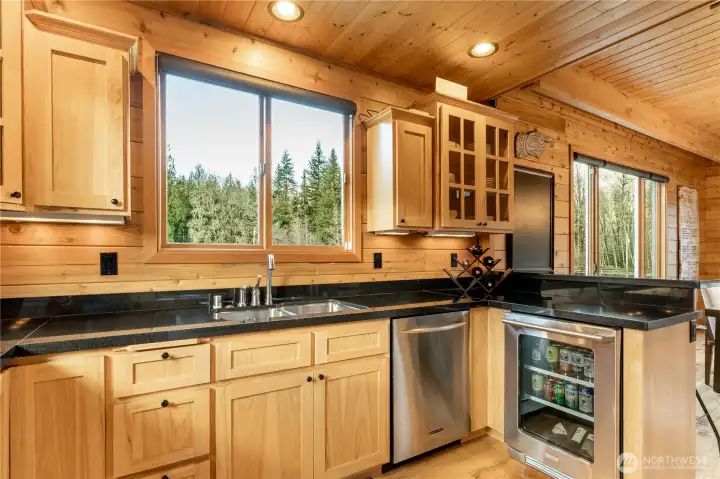 Light + Bright Kitchen with built in beverage fridge.
