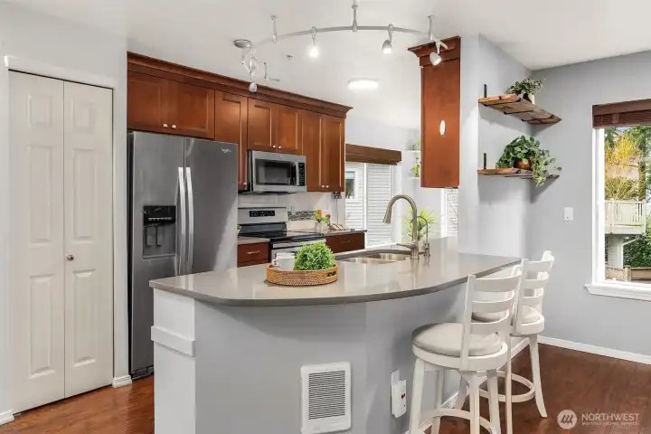 Gorgeous Hardwood Cabinets - Kitchen Features a Breakfast Bar