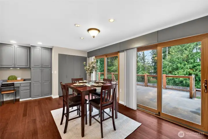 Built in deck and pantry along with the hidden laundry area featuring newer washer and dryer.  2 sliders lead to expansive deck