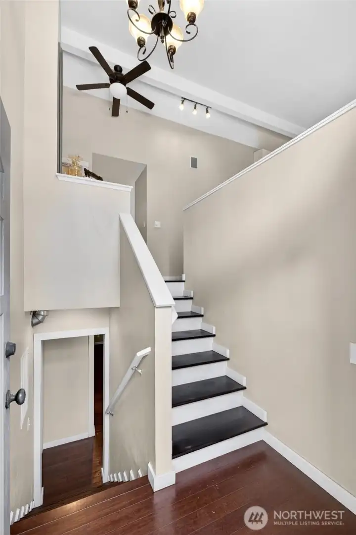 Welcoming front entrance leads to upstairs living space and huge downstairs entertaining