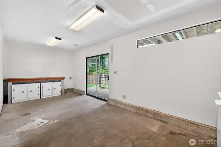 In addition to the extra deep 2 car garage, enjoy setting up your workshop in the bonus space with access to the backyard.  Perfect for hobbies, projects or extra storage