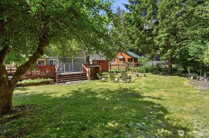 Back of Home with Large Deck for Entertaining or just taking in the sounds of Nature Back of Home with Large Deck for Entertaining or just taking in the sounds of Nature