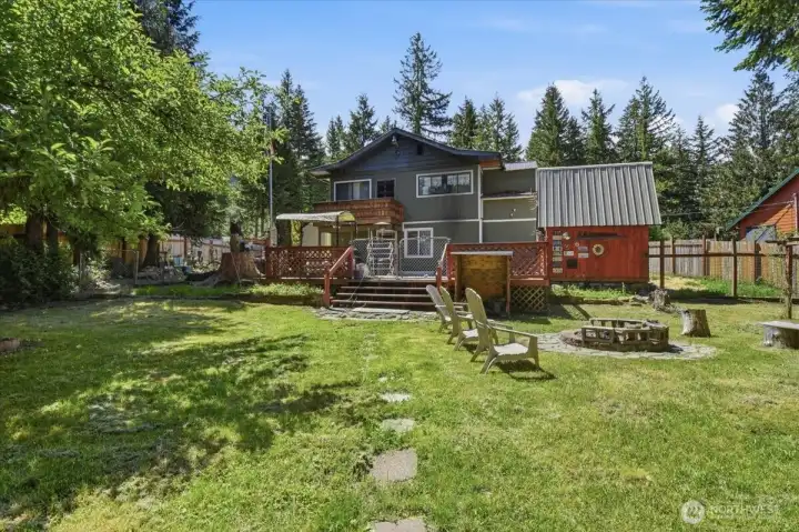 Back of Home with Large Deck for Entertaining or just taking in the sounds of Nature Back of Home with Large Deck for Entertaining or just taking in the sounds of Nature
