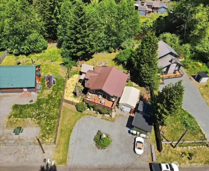 Ample driveway parking with 3 outbuildings for tone of storage Ample driveway parking with 3 outbuildings for tone of storage