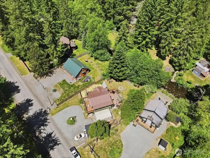 Ample driveway parking with 3 outbuildings for tone of storage Ample driveway parking with 3 outbuildings for tone of storage