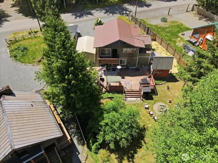 Back of Home with Large Deck for Entertaining or just taking in the sounds of Nature Back of Home with Large Deck for Entertaining or just taking in the sounds of Nature