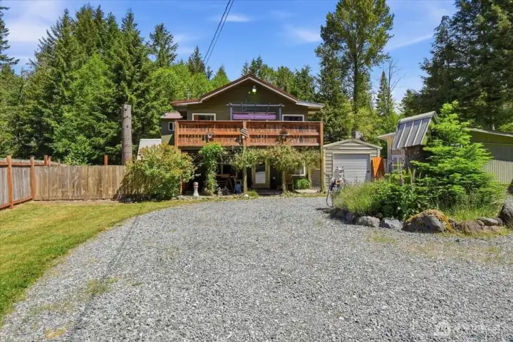 Ample driveway parking with 3 outbuildings for tone of storage Ample driveway parking with 3 outbuildings for tone of storage