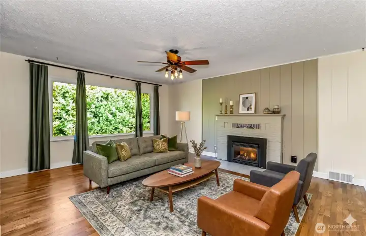 Upstairs living area of main house, hardwood floors, fireplace, bright and open Upstairs living area of main house, hardwood floors, fireplace, bright and open