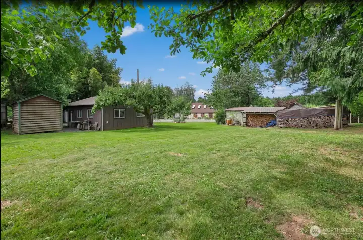 covered storage areas & additional detached stalls. The acreage includes an apple (30) orchard, covered parking areas for vehicles & equipment, multiple outbuildings, beautiful pond, & room for animals. covered storage areas & additional detached stalls. The acreage includes an apple (30) orchard, covered parking areas for vehicles & equipment, multiple outbuildings, beautiful pond, & room for animals.