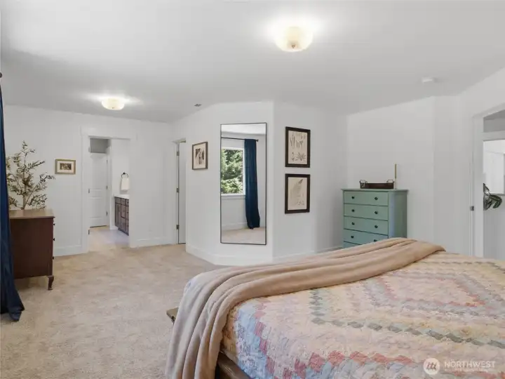 Large enough for a sitting area, and a spacious walk-in closet in the bedroom (not bathroom!).