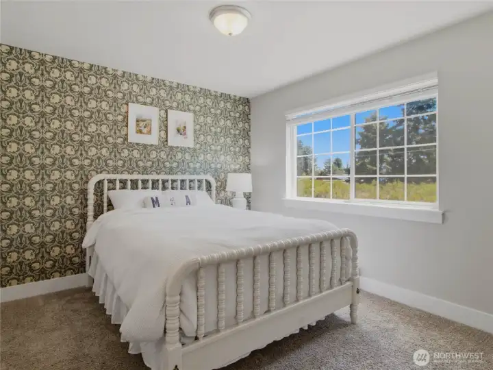 Third bedroom, with custom charming wallpaper.