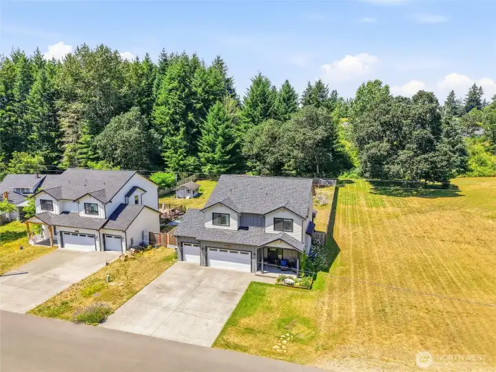 No neighbors to the right, another beautiful new home to the left.