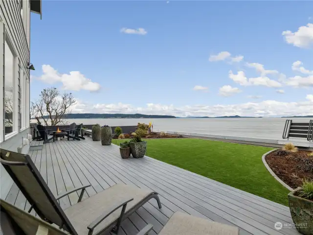 Enjoy the beautiful sunsets from this no bank waterfront home on Skagit Bay w/metal staircase and metal wrapped bulkhead top.