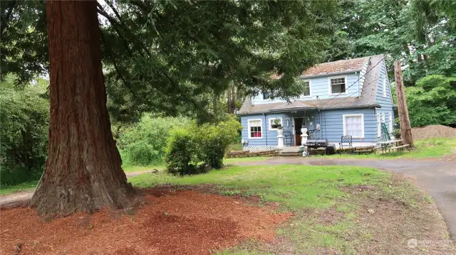 Front of home with columns.