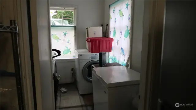 Laundry room really nice size right off the kitchen.