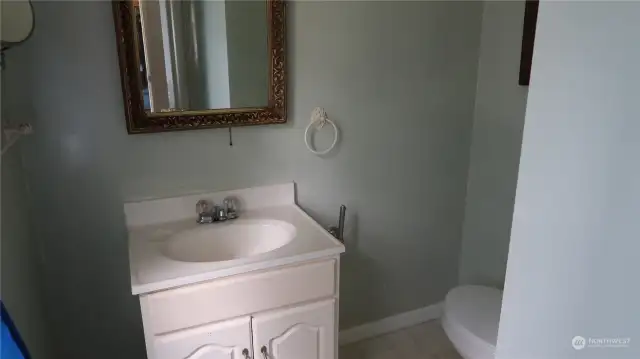 Upstairs half bath.