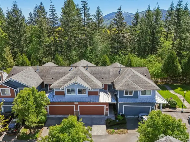 Extra Special location with forest, guest parking to right of building and pathway to trail.