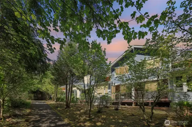 Perfectly situated with deck view of forest and pathway. Peaceful
