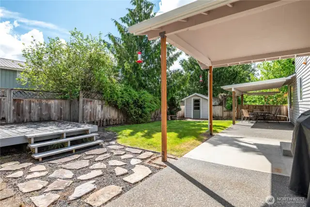 Beautiful fenced backyard with 2 covered patios