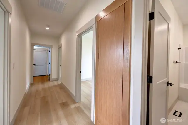 Hallway has unique hidden closet