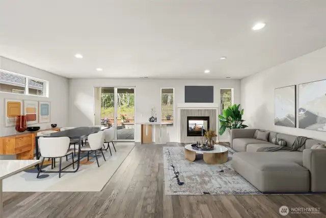 Dual Sided Fireplace Centers the Great Room! Abundant Natural Light! Backyard Privacy! Virtually Staged