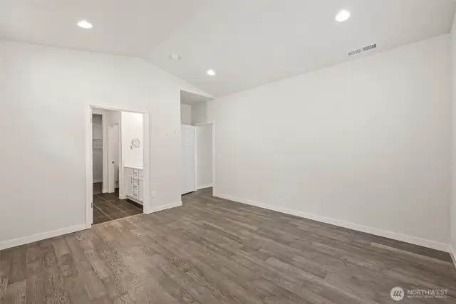 Primary Retreat Located Off the Great Rm! Tall Ceilings & Laminate Floor!