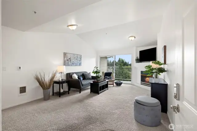 Sliding glass door out  to private balcony with storage closet.