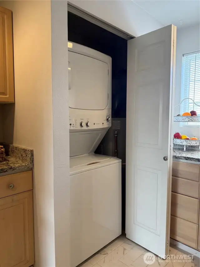 Stackable washer and dryer - hot water heater.