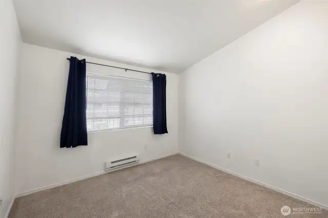 Guest room with vaulted ceilings.