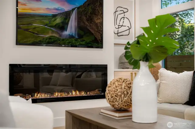 Enjoy the electric fireplace ambience in the living room.