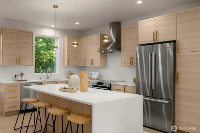 Beautiful quartz waterfall island and countertops.