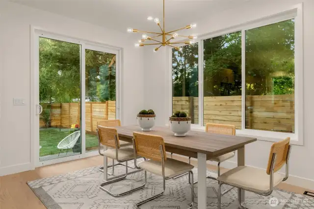 Dining room with slider access to the expansive patio and back yard.