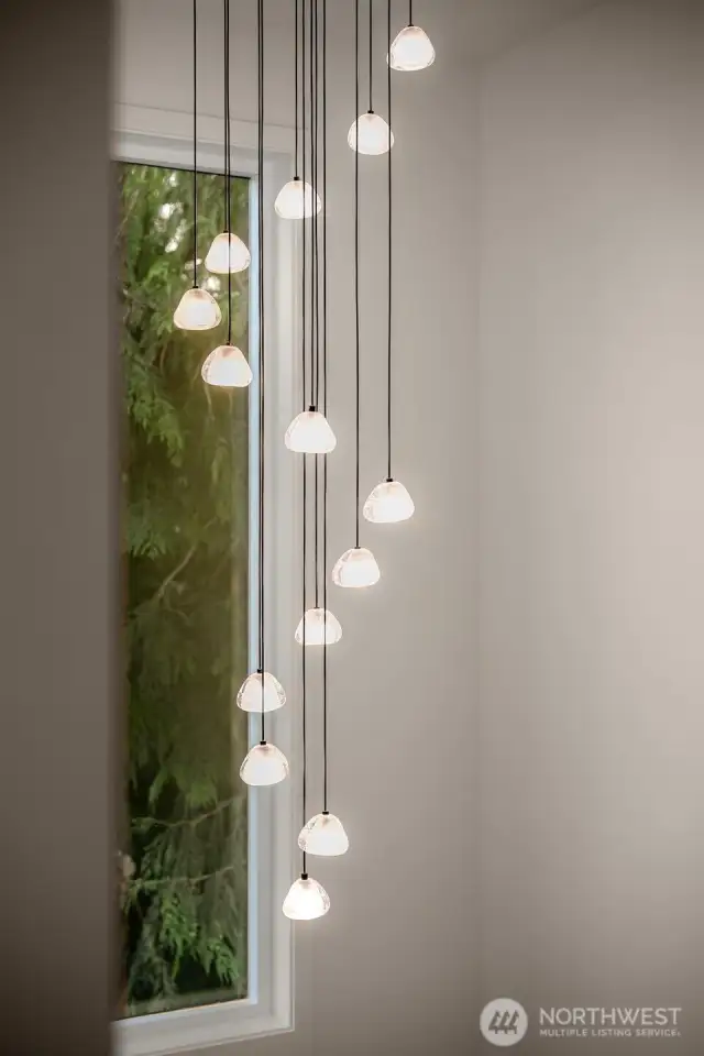 Gorgeous chandelier as your head upstairs.