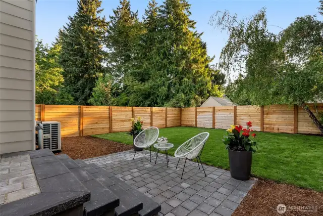 Patio for entertaining and enjoy the gorgeous views of mature trees, including leyland cypress, red cedar and birch.