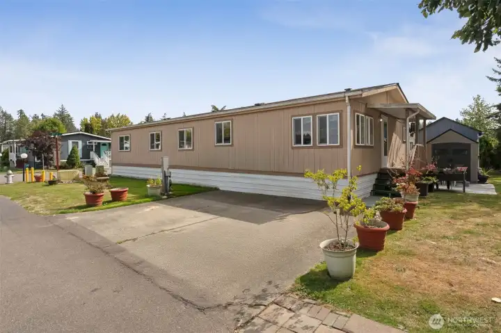2 Parking Spots ~ steps away to the back door, through the utility room and straight into the kitchen!