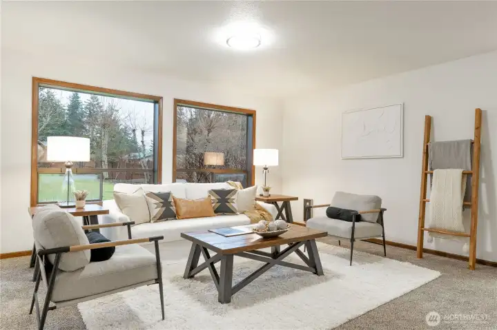 Lower large windows view the backyard.