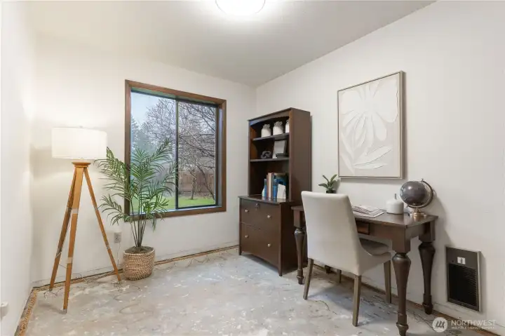 Third bedroom here staged as an office.  Flooring is now new vinyl plank.