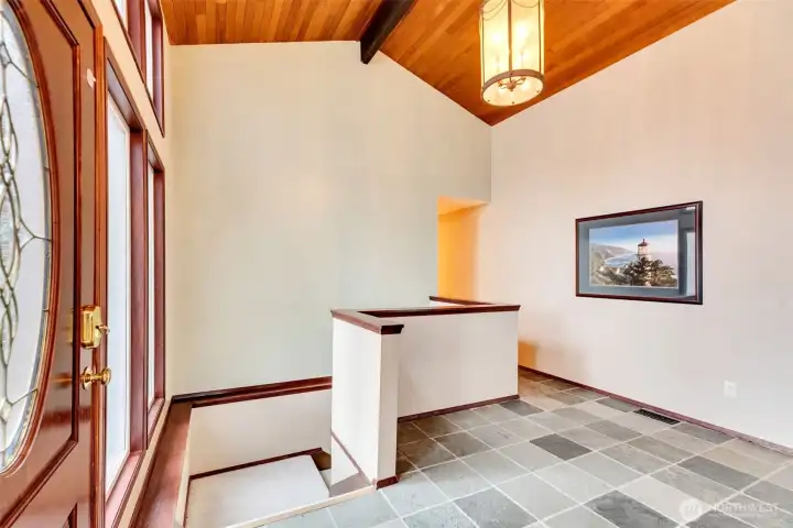 Foyer with vaulted Pine Accent Ceilings