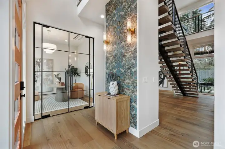 Main floor office with beautiful gridded glass french doors