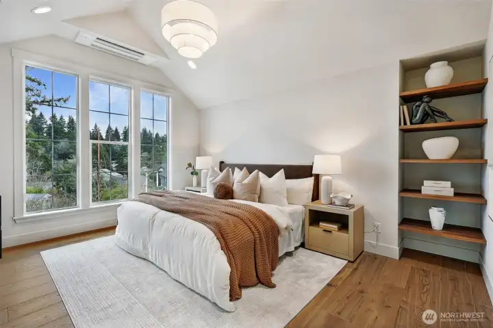 Primary suite w/vaulted ceilings