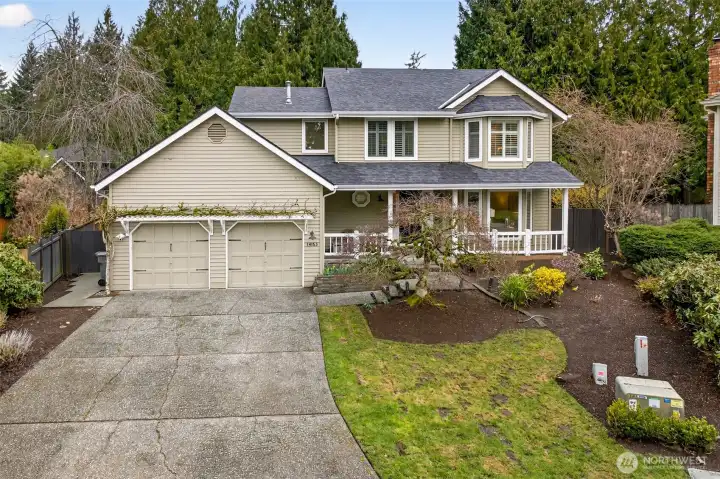 Classic curb appeal meets a peaceful setting in this Redmond English Hill location. The wide driveway, two car garage, and charming porch invite you in, with the home positioned for privacy on a generous 10,543 sq ft lot.
