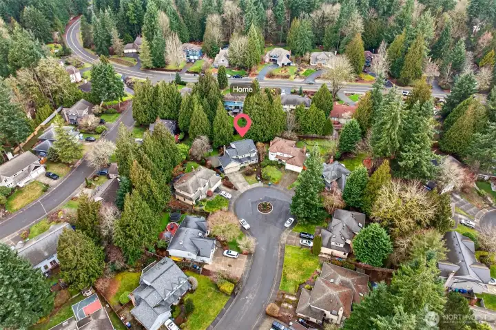 A neighborhood aerial confirms how tucked away this home is, positioned at the back of the cul de sac with a strong sense of separation from through traffic. The surrounding tree canopy reinforces the peaceful, established feel English Hill is known for.