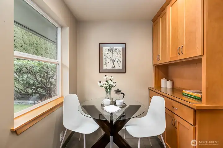 Closer view of the casual eating space and built-ins...