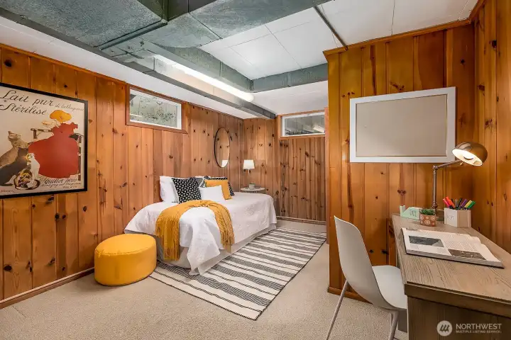 The lower level offers a third bedroom with an attached bath... Great guest quarters or office space.